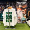 Natural COLD WHITE BOY graphic t-shirts displayed beside a Payton Pritchard Pritch Please banner.