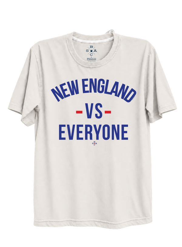 New England vs Everyone throwback T-shirt with blue lettering and red accents on an off-white shirt